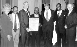 Earl White receiving award